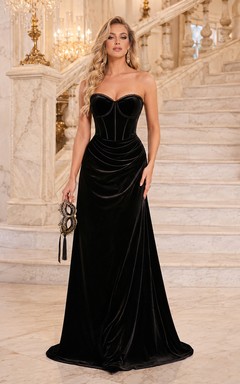 Black strapless velvet mermaid gown with corset seams