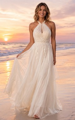 Vestido de novia largo de tul con escote halter y corte en A para fugarse a la playa