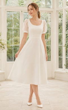 Vestido formal de corte A, largo midi, de gasa blanca con escote redondo y manga corta, de la línea Modern Line.