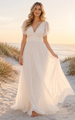 Robe de mariée bohème en mousseline, col en V, manches papillon, coupe empire, longueur au sol, idéale pour la plage
