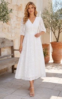 Vintage-Kleid in A-Linie mit dezentem, halblangem Ärmel, V-Ausschnitt, Stickerei und Teelänge