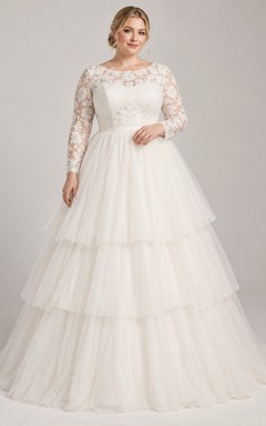 Vestido de novia de encaje de manga larga con escote redondo discreto y falda de tul escalonada en línea A.
