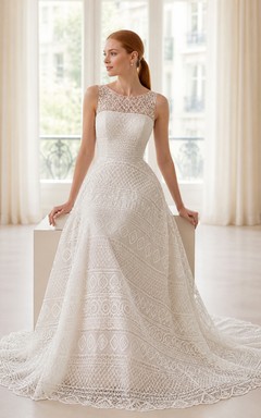 Vestido de novia moderno de corte A, sin mangas, con escote barco y encaje geométrico estilo catedral.