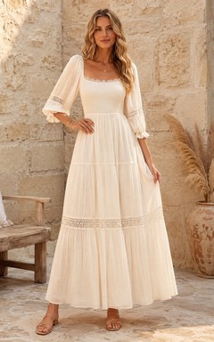 Vestido bohemio de corte A con escote cuadrado y mangas largas, ribete de encaje.