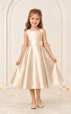 Robe de demoiselle d'honneur champêtre en satin champagne sans manches, longueur thé, coupe trapèze, avec nœud