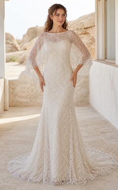 Vestido de novia bohemio estilo barco con mangas murciélago y encaje geométrico.