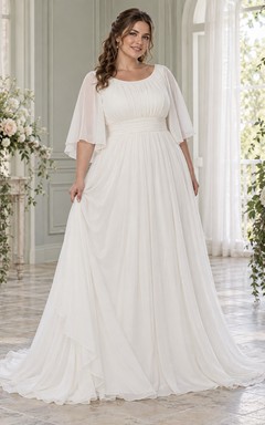 Vestido de novia de gasa de corte A con escote redondo discreto, mangas cortas con volantes y cintura fruncida.
