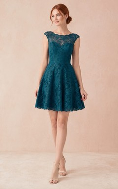 Dunkelgrünes Cocktailkleid aus Spitze mit bedecktem Rücken und transparentem Oberteil