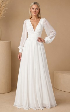 Vestido de gasa blanco de corte A, largo hasta el suelo, con escote en V y mangas largas, ideal para invitadas románticas.