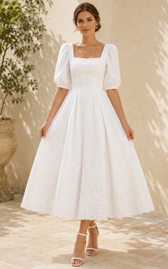 Vestido de novia romántico de encaje con escote cuadrado y mangas abullonadas hasta la rodilla