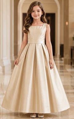 Robe de demoiselle d'honneur sans manches en satin champagne, coupe trapèze, encolure bijou et jupe longue ornée d'un nœud.
