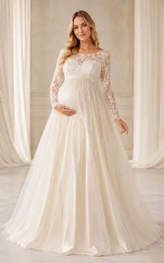 Vestido de novia romántico de manga larga con encaje y tul, estilo princesa, ideal para embarazadas y novias.