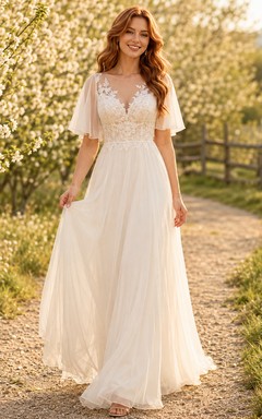 Vestido de novia campestre de tul, corte en A, escote en V, mangas con volantes, cola larga y espalda baja en V.
