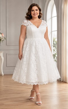 Romantisches, klassisches Brautkleid in Übergröße mit Spitze, herzförmigem Ausschnitt, kurzen Ärmeln, A-Linien-Schnitt und Teelänge