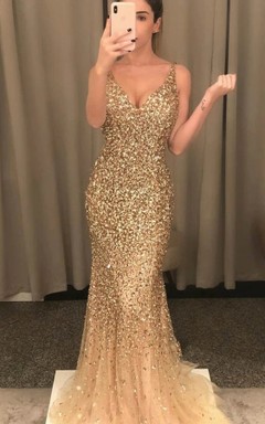 Sexy vestido de noche largo sin mangas con escote en V profundo en la espalda y corte trompeta, de tul y lentejuelas.