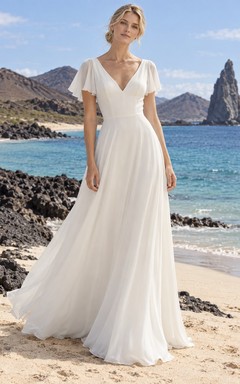 Vestido de novia de georgette con escote en V, mangas con volantes, corpiño liso y falda en línea A.