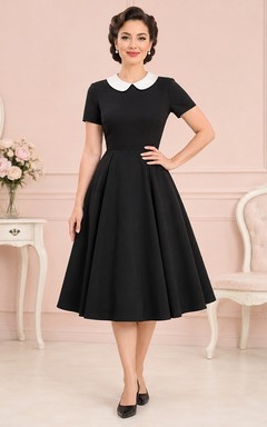 Vintage Black Jewel Neck Short Sleeve Contrast Collar A-Line Tea-Length 1950s Dress