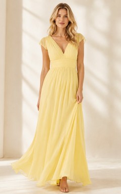 Robe d'été romantique jaune en mousseline, col V, manches courtes, coupe trapèze, longueur au sol