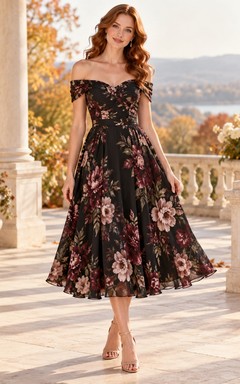 Vestido de invitada negro con estampado floral, corte en A, hombros descubiertos, manga corta y largo hasta la rodilla.
