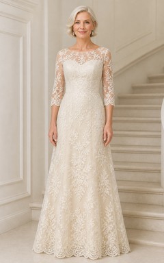 Robe de mère de la mariée, délicate et pudique, en dentelle, coupe trapèze, longueur au sol, manches trois-quarts, col bateau, manches trois-quarts.