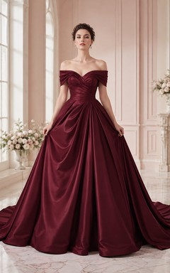 Robe de bal romantique en satin bordeaux à épaules dénudées et drapée, idéale pour une mariée.