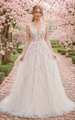 Vestido de novia de gala de tul con estampado floral pastel y efecto ilusión de jardín