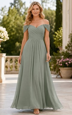 Vestido formal de gasa color verde salvia con hombros descubiertos para mujer madura.