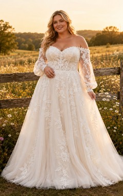 Robe de mariée champêtre en tulle et dentelle, coupe trapèze, épaules dénudées, manches longues, traîne chapelle
