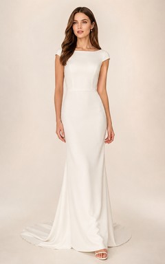 Vestido de novia sencillo y modesto, de corte recto, con mangas cortas, escote barco y cola.