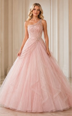 Robe de bal de luxe rose poudré à une épaule, ornée de cristaux et de tulle pailleté drapé, idéale pour les 16 ans.