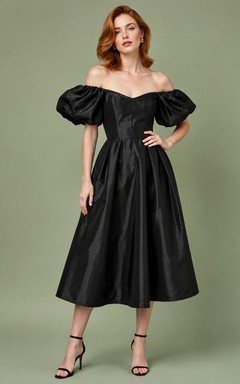robe de cocktail trapèze en taffetas noir à épaules dénudées et manches bouffantes
