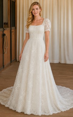 Vestido de novia romántico de corte A con escote cuadrado y mangas abullonadas, estilo catedral y encaje.