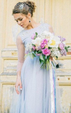 Vestido largo de tul con mangas largas transparentes