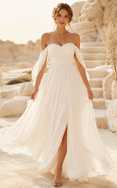 Vestido de novia de gasa con hombros descubiertos y mangas cortas, estilo vaporoso, ideal para una boda íntima.