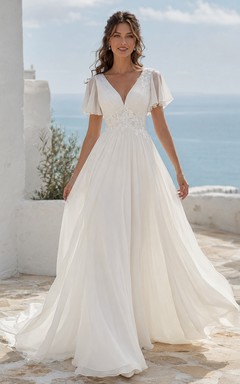 Robe de mariée trapèze en mousseline de soie à manches papillon et décolleté plongeant en V profond