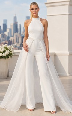 Combinaison de mariée blanche dos nu avec surjupe en tulle et traîne