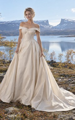Vestido de novia de tafetán color champán con escote asimétrico, corte en A, escote plisado y corpiño con paneles.