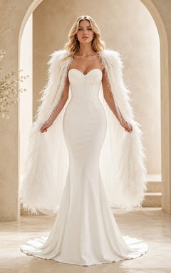 Robe de mariée sirène de luxe en satin et plumes, style classique, décolleté cœur.