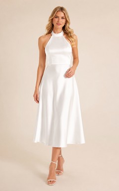 Vestido de fiesta vintage blanco sin mangas de satén con escote halter y corte en A, largo hasta la rodilla.