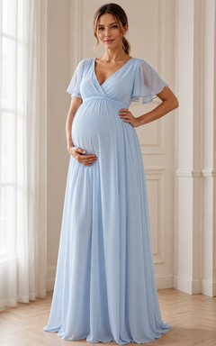 Robe longue de maternité bleu ciel en mousseline, col V, manches papillon doubles, style portefeuille, à col en V.