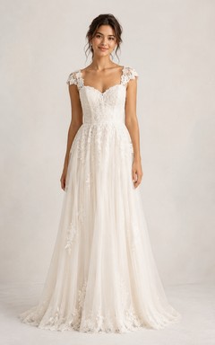 Robe de mariée simple et décontractée de coupe trapèze, manches courtes, décolleté cœur, tulle, dentelle appliquée, longueur au sol, traîne, blanche