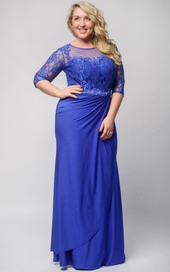 Vestido tubo largo hasta el suelo con mangas cortas, detalles de pedrería, encaje y cremallera.