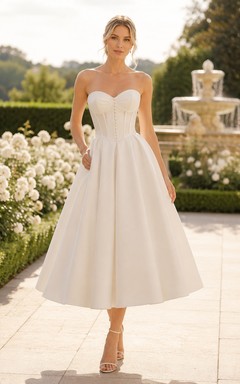 Robe de mariée bustier en satin, longueur thé, avec corsage boutonné