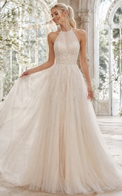 Vestido de novia de tul con escote halter, estampado floral, corte en A, encaje y espalda descubierta