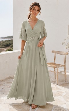 Vestido de invitada largo hasta el suelo, de corte A, con escote en V, manga corta, falda acampanada, encaje, fajín/cinta, espalda baja y cuello en V, color celadón.