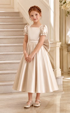Robe de demoiselle d'honneur champêtre en satin champagne, manches bouffantes, longueur thé, coupe trapèze, avec nœud surdimensionné
