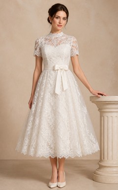 Vestido de novia vintage de largo midi con mangas cortas y lazo de encaje
