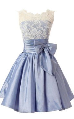 Robe trapèze sans manches avec nœud et corsage en dentelle