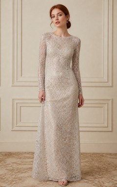 Elegante vestido de noche largo hasta el suelo, de corte recto, manga larga, color plata, con encaje brillante.