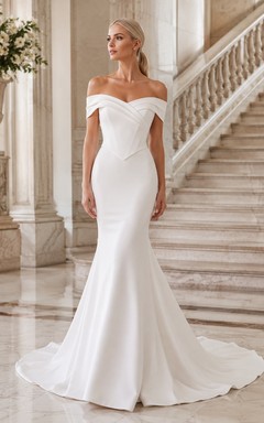 Vestido de novia sencillo estilo sirena con escote Bardot, cintura baja y cola.